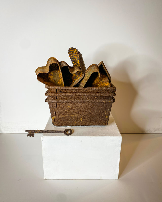 Noted Boston sculptural photography artist David Lee Black creates whimsical art out of found objects.