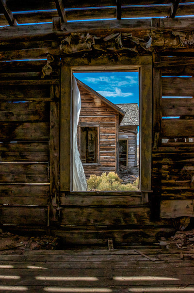 Noted Boston fine art photographer David Lee Black explores Piedmont, Wyoming with veil and tumbleweed.